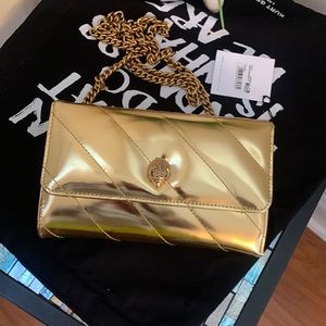 - Kurt Geiger London SoHo Leather Chain Wallet
Kurt Geiger London